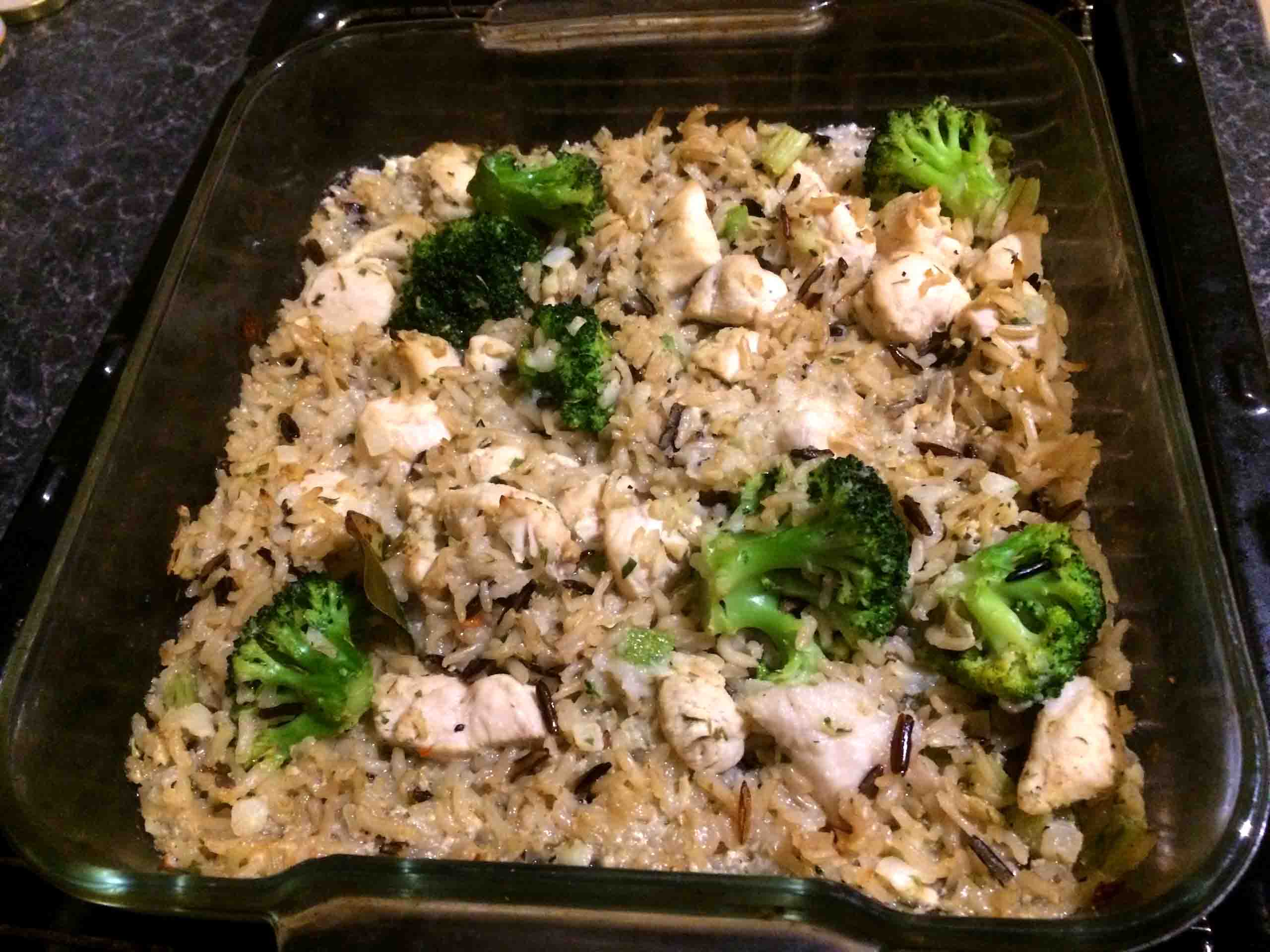 Photo of the roasting dish with chicken, wild rice, and broccoli.