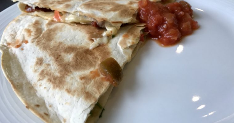 Sundried tomatoes, red peppers, and coriander quesadilla